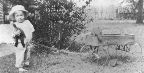 Burt Presser 1915 & wagon